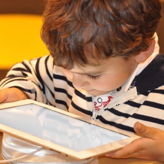 child and tablet